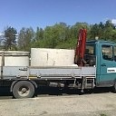 We transport sewage pipes, lids and rests