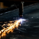 Working with modern laser cutting equipment, providing accurate solutions.