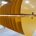 Powder coating of metal parts