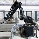 Automation of manufacturing and production processes: warehouse management, transportation and relocation, packing