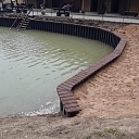 Excavation of water bodies and strengthening of the shoreline