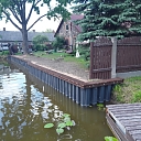 Excavation of water bodies and strengthening of the shoreline