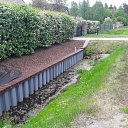 Excavation of water bodies and strengthening of the shoreline