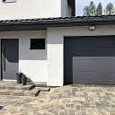 Wisniowski garage door in the same style as the front door