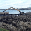 Excavation of water bodies and strengthening of the shoreline