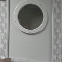 PVC door with round glass