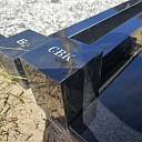 washing tombstones