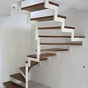 Modern metal and wooden stairs for the interior