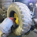Agricultural and heavy equipment tire assembly
