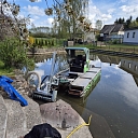 Cleaning and deepening of a private pond with floating equipment