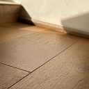 Rich and deep dark oak parquet adds luxury to your spaces