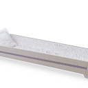 A coffin draped with linen