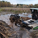 Water purification using amphibious equipment