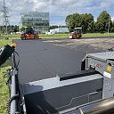 Resurfacing of asphalt in a parking lot