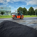 Resurfacing of asphalt in a parking lot