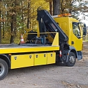 Specialized tow truck with crane equipment