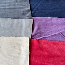 Fabric samples in different colors – cotton, knitwear and other materials