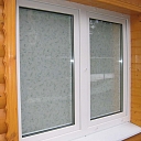 PVC windows for wooden houses
