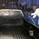 Coating of automobile cargo boxes