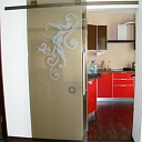 Glass sliding door with ornament