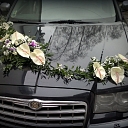 Car bouquet with flower garlands in Jelgava