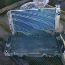Straightening and repairing damaged car radiators