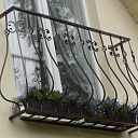 Decorative wrought metal balcony railings in Daugavpils