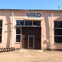 Garage gate with a door for staff in Cesis Valmiera Ventspils Jelgava