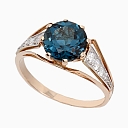 Gold ring with topaz