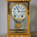 19th century. gilded table clock - restored