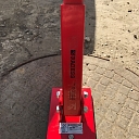 Manhole cover lifting magnet