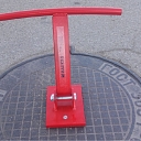 Manhole cover lifting magnet