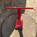 Manhole cover lifting magnet
