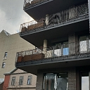 Ascetic balcony railings for Parkers business apartments