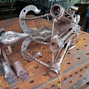 Refurbished flag holders before galvanizing and painting