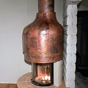 Copper fireplace in a private house in Amatciems