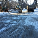Snow cleaning, clearing sidewalk parking lots from snow.
