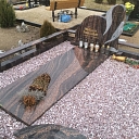 Granite stone tombstone and curb