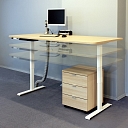 Electrically adjustable table
