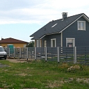 Wooden fence on metal poles