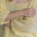 A warm and cozy sweater with a unique style.
