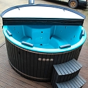 Large tub with integrated oven