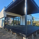 Construction of a modern private house with a terrace