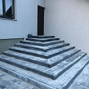 Wide paved staircase with several levels