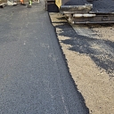 Asphalt pavement emplacement