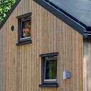 Koka mājas fasāde