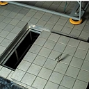 Floor tile hatch