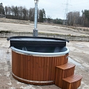 Hot tub with integrated oven