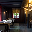 The interior of the Postman's House combines warm lighting and a peaceful atmosphere for a comfortable stay.