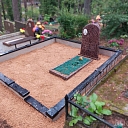 Cemetery with tombstones and gravel borders